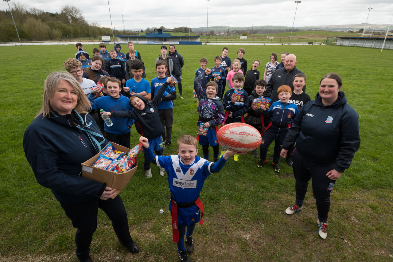 RUSSELL HOMES ROCHDALE HORNETS Jackie Matheson with children